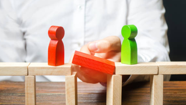 Foto ilustrativa de peças de blocos que ilustram uma conciliação